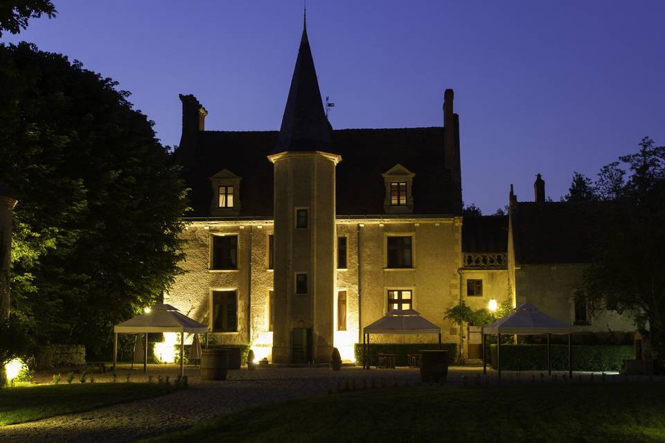 The château lit up at nightfall